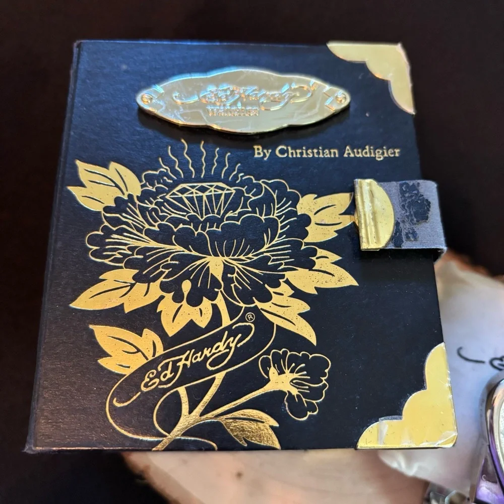 Vintage Ed Hardy Silver Smartwatch with Artistic Design